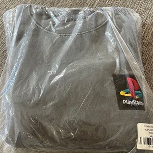 Cactus Jack PlayStation Classic Crewneck in gray.